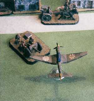 A Stuka attacking a French antitank gun.