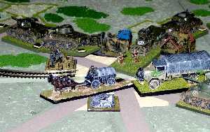 A German horse-drawn supply unit causes a traffic jam when it is caught by the advancing Americans.  Tim Gow