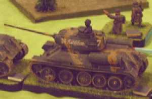 A T34 of the 5th Guards Tank Corps moves forward.
